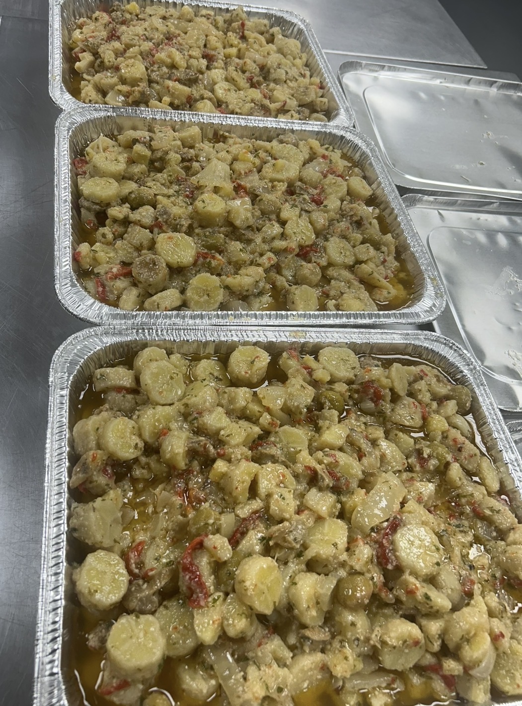 Puerto Rican guineos en escabeche catering trays