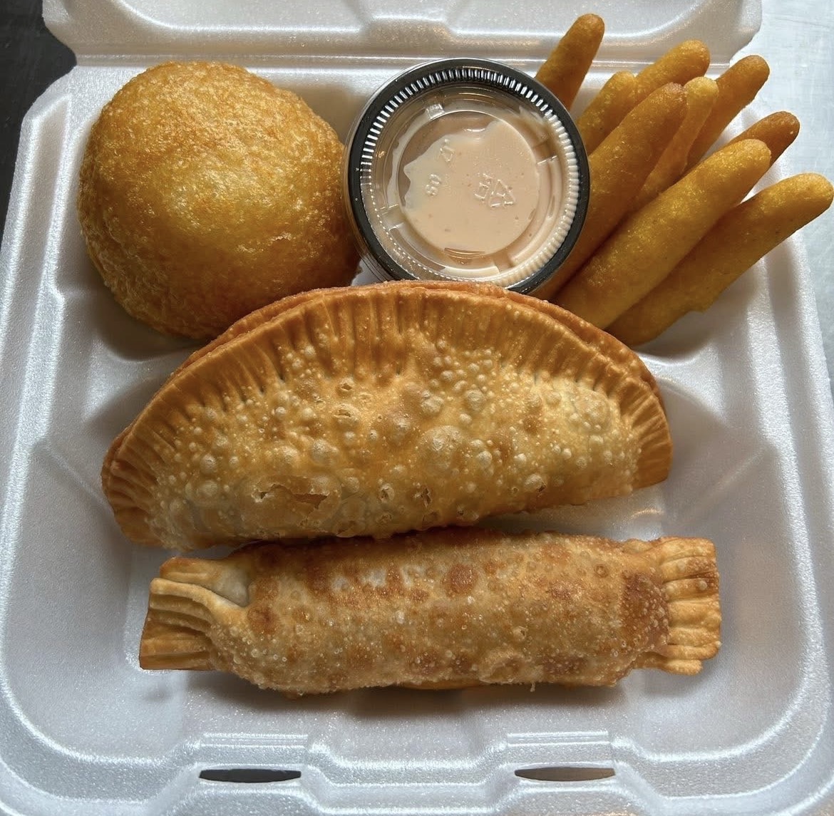 Puerto Rican appetizer platter with empanadilla and sorullitos