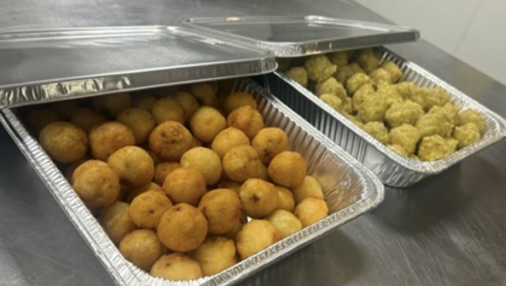 Puerto Rican fried appetizers in catering trays